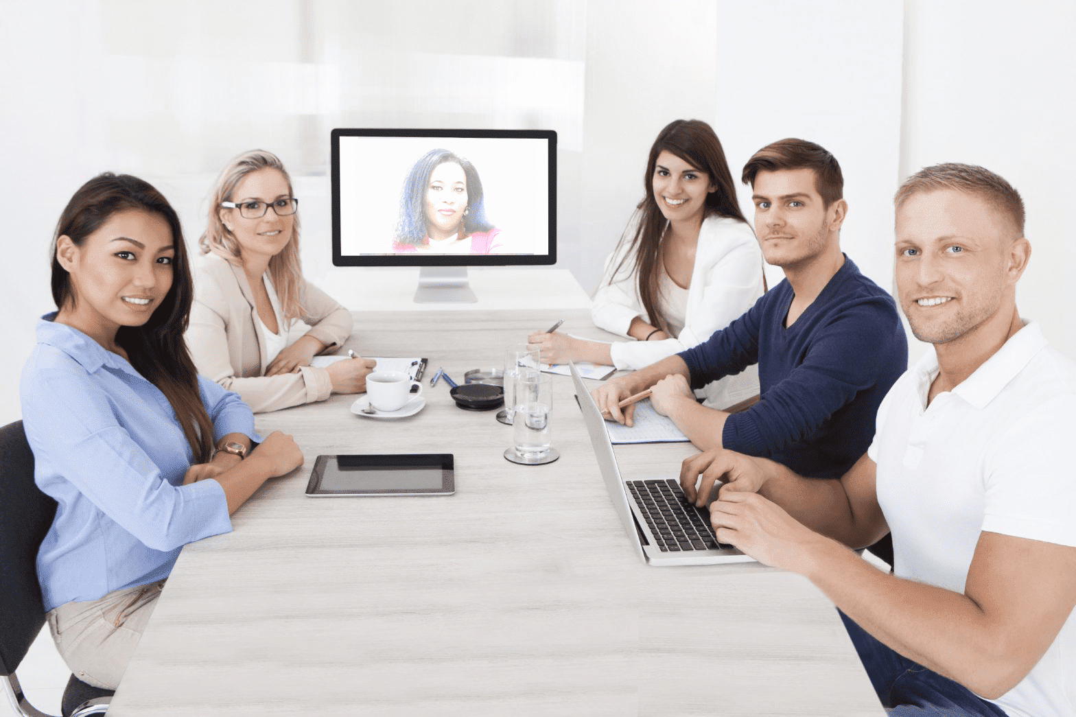 business team attending video conference 1568x1045 1 business team attending video conference 1568x1045 1